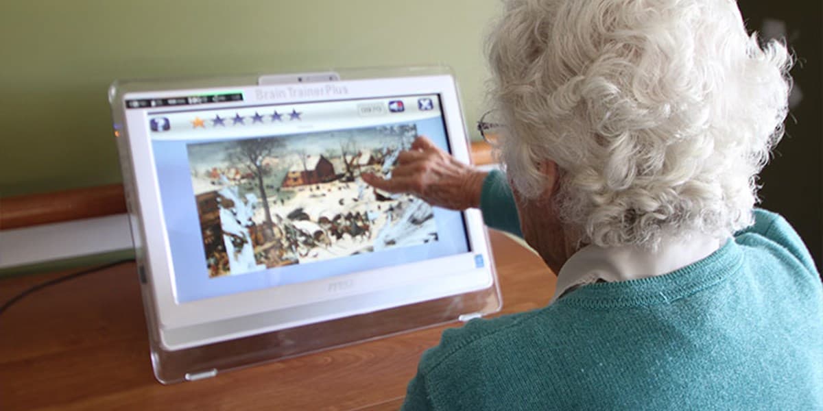 BrainTrainerPlus touchscreen console set up for aged care activities